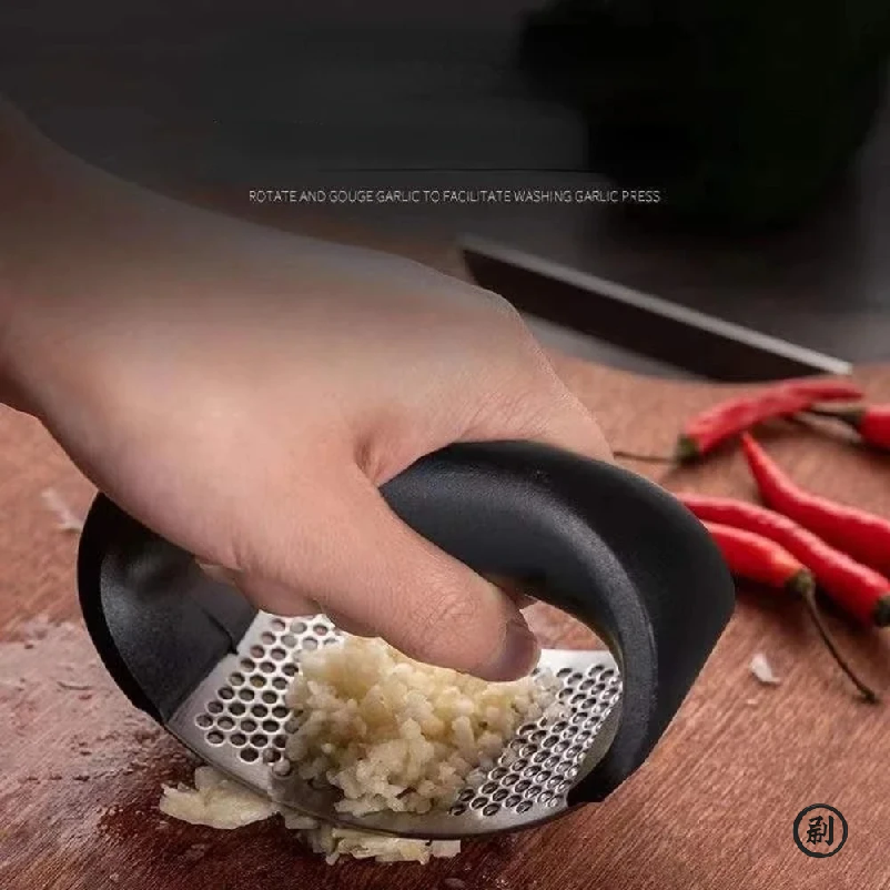 Stainless Steel Garlic Press C - Kitchen Gadgets Everyone Needs recension och pris